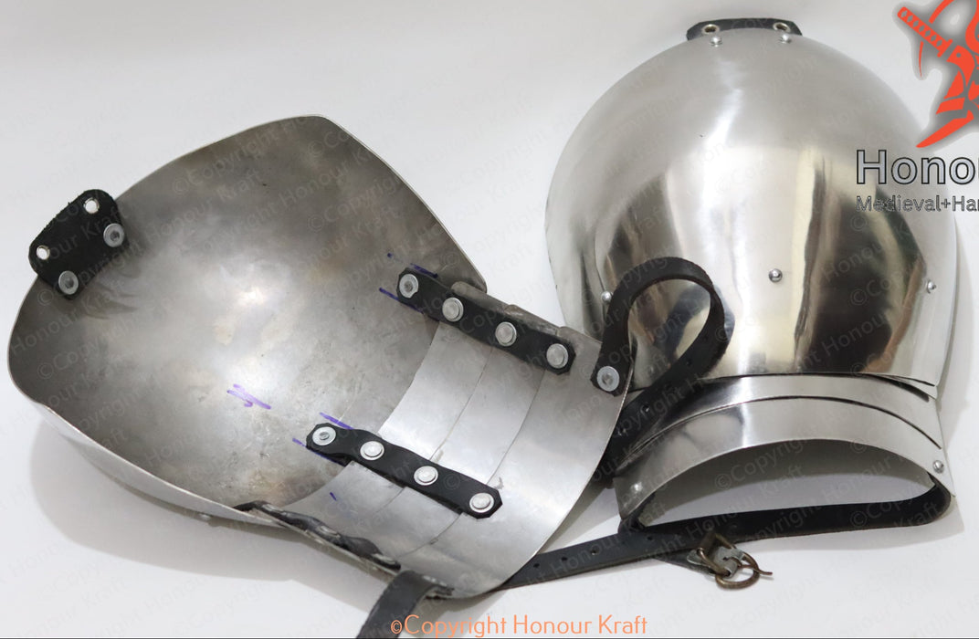 Medieval steel plate shoulder armor with rounded cops